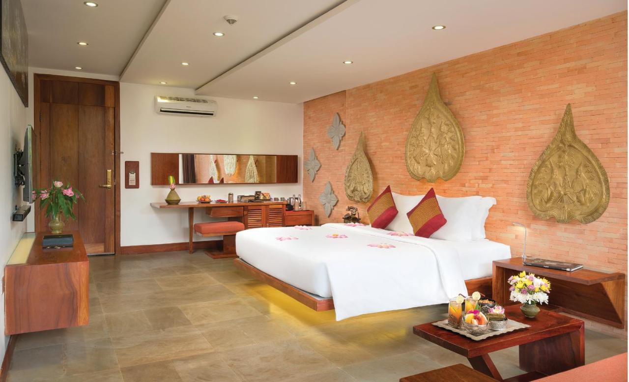 Golden Temple Residence Siem Reap Exterior foto A bedroom at the hotel